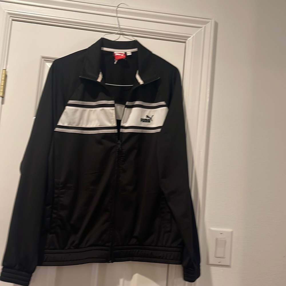 Puma medium size sports jacket, and a very good condition slightly used.